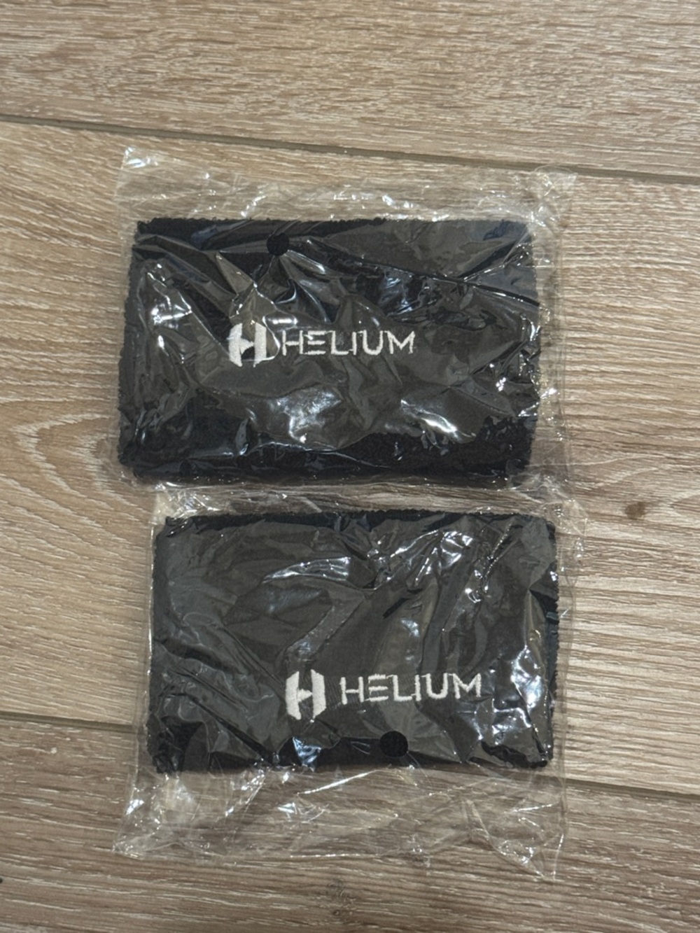 NWT Helium Black Wrist/Hand Warmers with Logo
